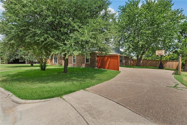 view of home's exterior with a yard