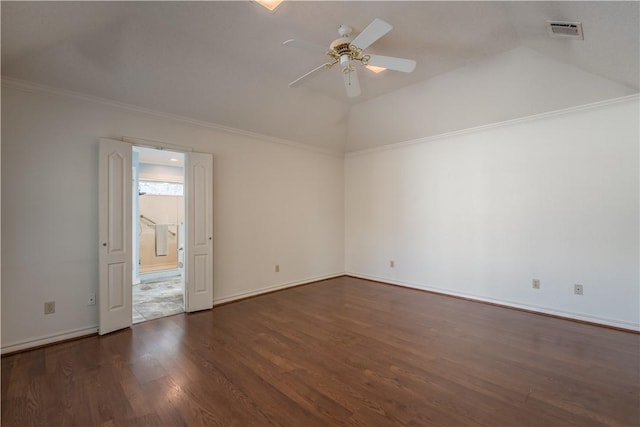 unfurnished room featuring ceiling fan, lofted ceiling, dark hardwood / wood-style floors, and ornamental molding