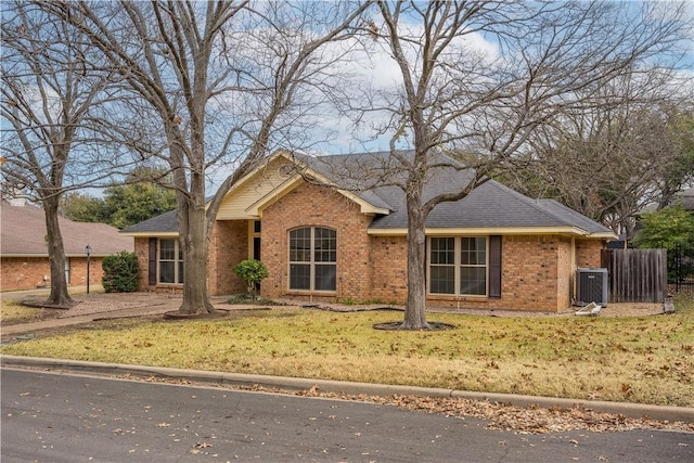 single story home featuring central AC and a front lawn