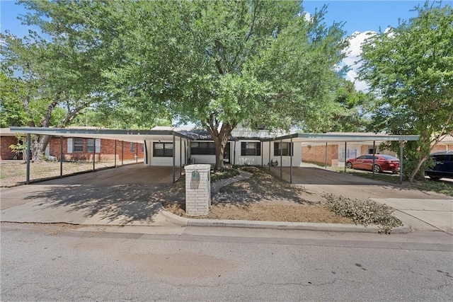 view of front facade featuring a carport