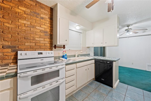 kitchen with white cabinets, white range, black dishwasher, and a textured ceiling