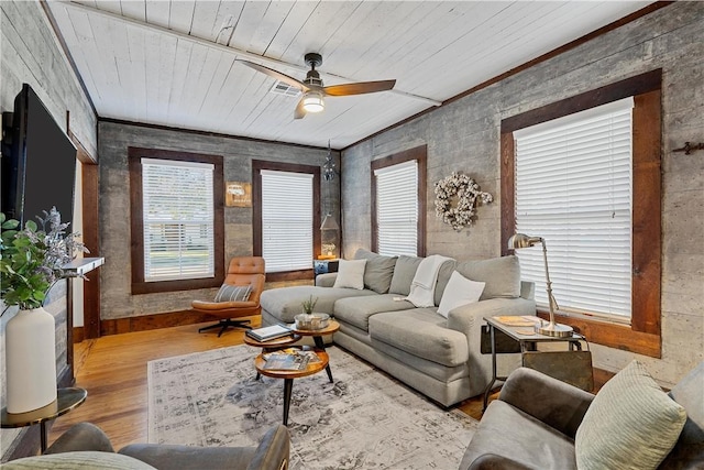 living room featuring light hardwood / wood-style flooring, ceiling fan, and wood ceiling