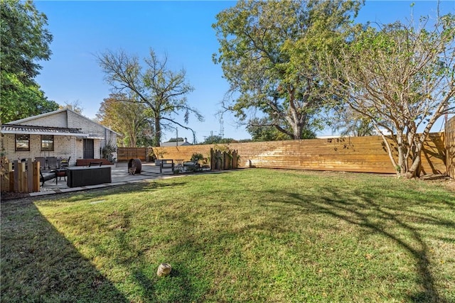 view of yard with a patio area and an outdoor living space