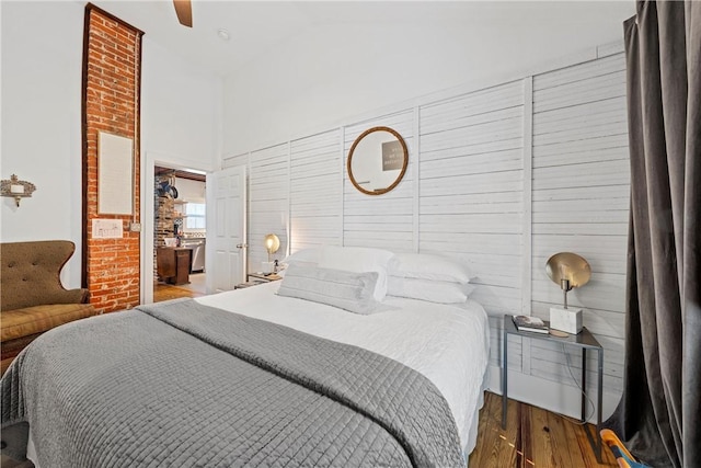 bedroom featuring ceiling fan and wood-type flooring