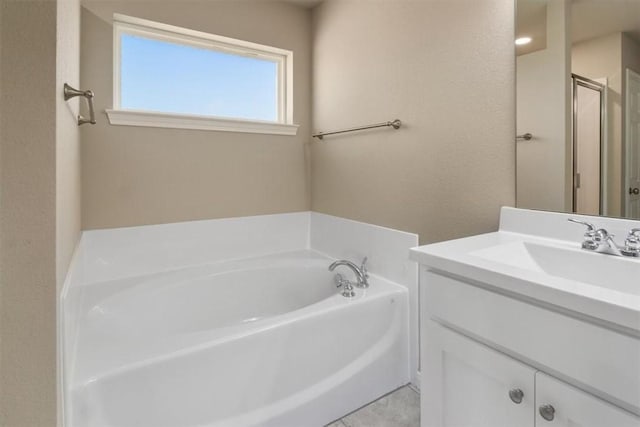 bathroom with vanity, tile patterned floors, and independent shower and bath