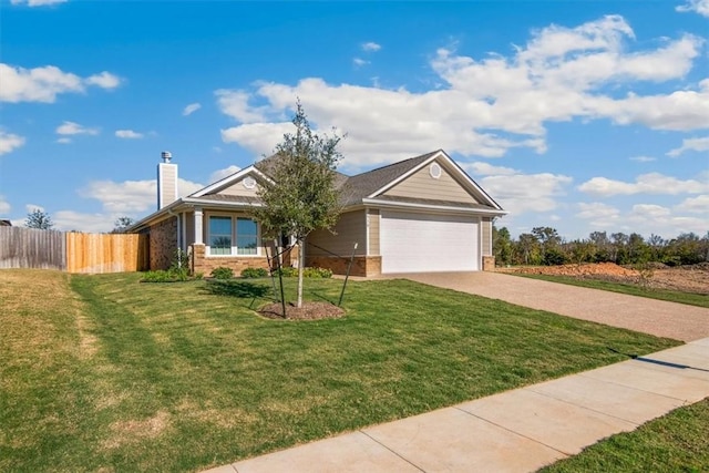 view of front of house with a garage and a front lawn