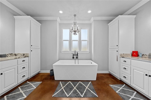 bathroom with vanity, crown molding, a bath, and a chandelier