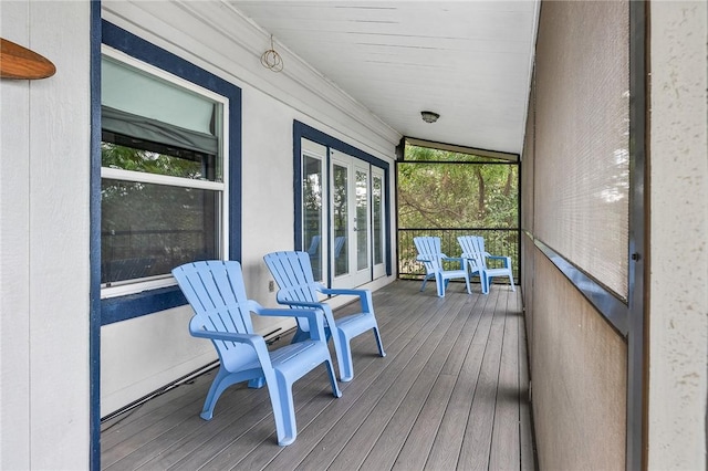 sunroom / solarium with vaulted ceiling