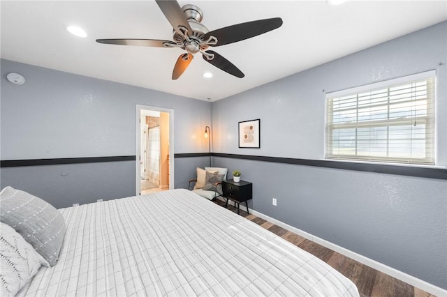 bedroom featuring ceiling fan, wood-type flooring, and connected bathroom