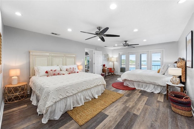 bedroom featuring ceiling fan, dark wood-type flooring, access to outside, and french doors