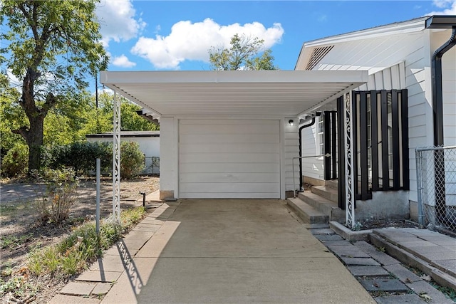 view of parking / parking lot featuring a carport