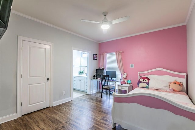 bedroom featuring ceiling fan, crown molding, dark wood-type flooring, and ensuite bath