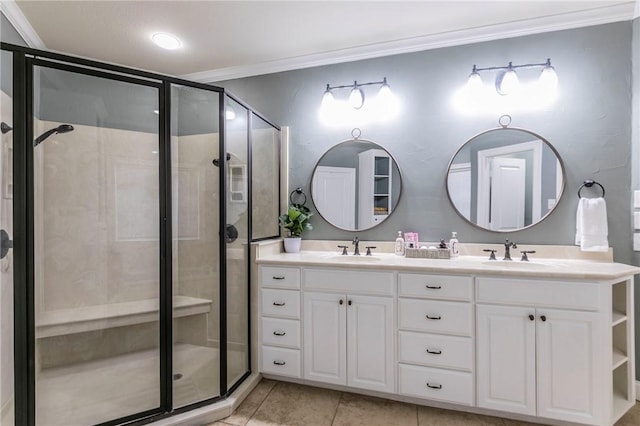 bathroom with crown molding, tile patterned flooring, vanity, and an enclosed shower