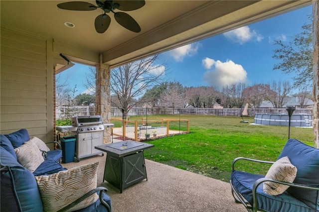 view of patio with an outdoor hangout area and ceiling fan