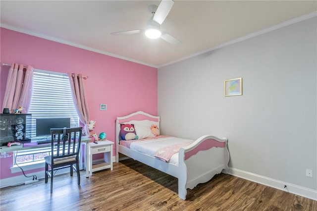 bedroom featuring multiple windows, ceiling fan, dark hardwood / wood-style flooring, and crown molding