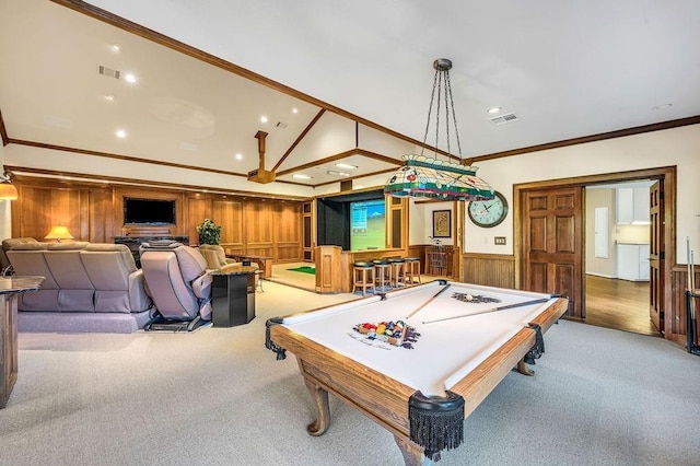 rec room with crown molding, pool table, and light carpet