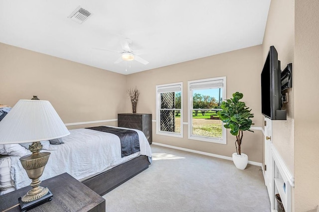 carpeted bedroom with ceiling fan