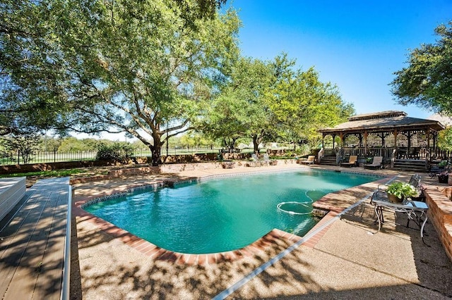 view of pool featuring a gazebo and a patio area