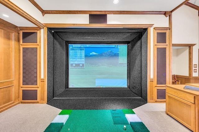 rec room with golf simulator, ornamental molding, and carpet flooring