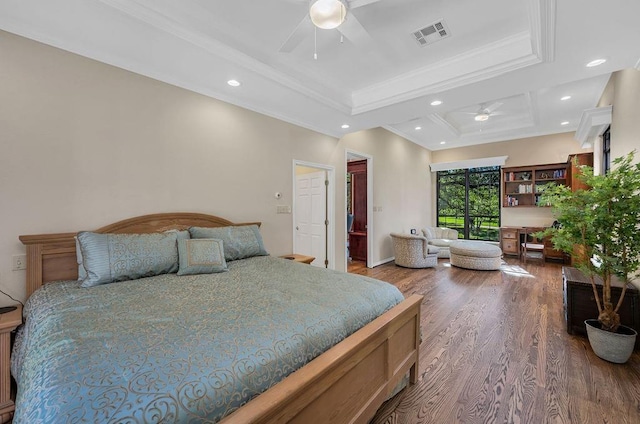 bedroom with ornamental molding and dark hardwood / wood-style flooring