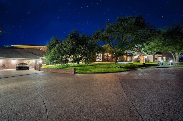 view of front of home with a lawn