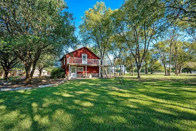 view of yard with a wooden deck