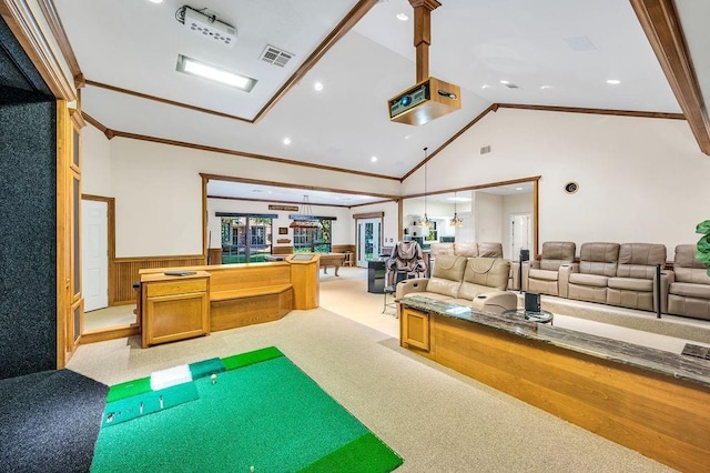 game room with high vaulted ceiling, light colored carpet, and ornamental molding