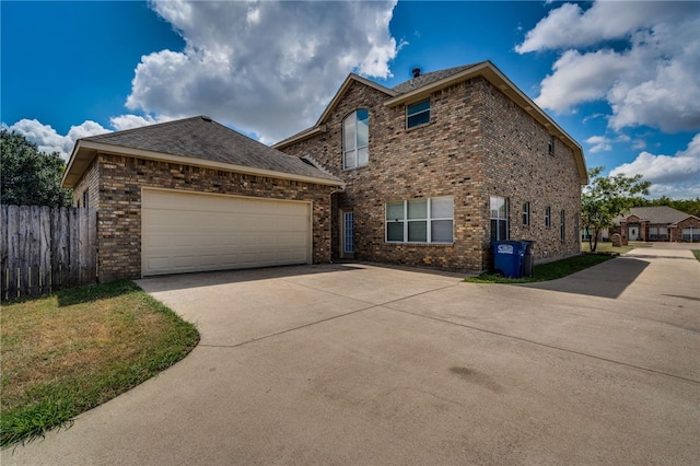 front of property with a garage