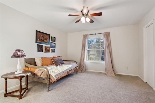 bedroom featuring ceiling fan, carpet flooring, and baseboards