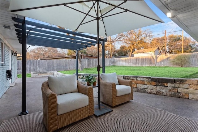 view of patio / terrace featuring a fenced backyard, an outdoor hangout area, and a pergola