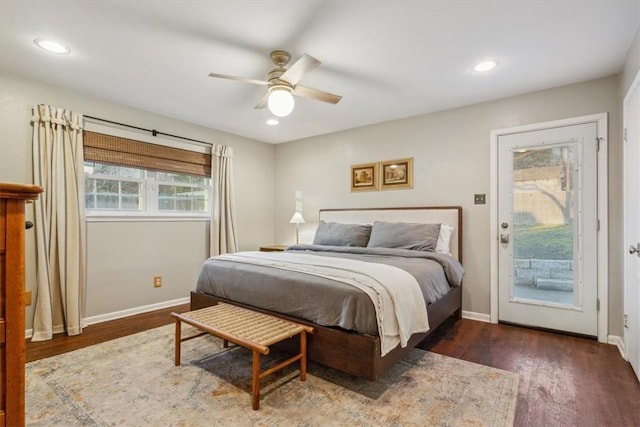 bedroom with access to outside, baseboards, wood finished floors, and recessed lighting