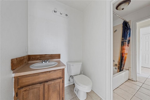 full bathroom featuring tile patterned flooring, shower / bath combo, vanity, and toilet