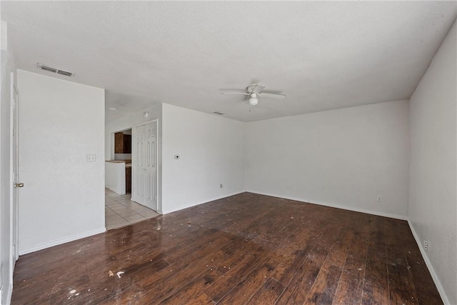 spare room with ceiling fan and light hardwood / wood-style floors