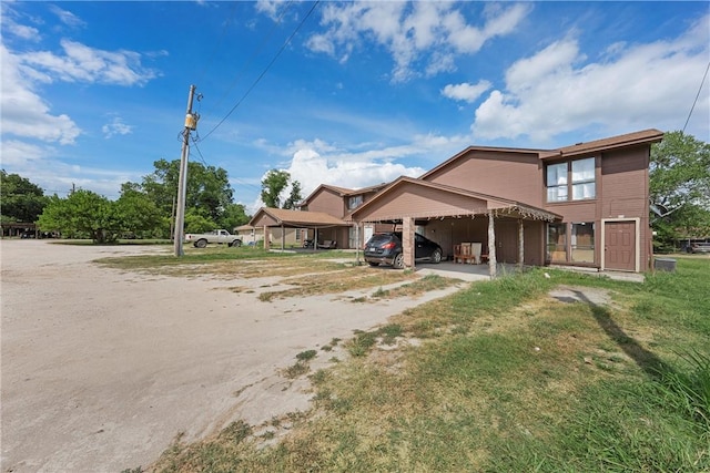 view of front of house featuring a carport