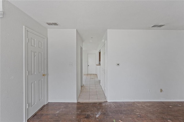 spare room featuring light hardwood / wood-style flooring