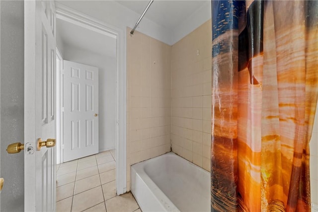 bathroom with tile patterned floors and shower / bathtub combination with curtain