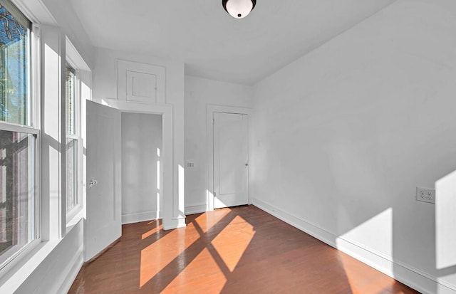 empty room featuring dark hardwood / wood-style floors