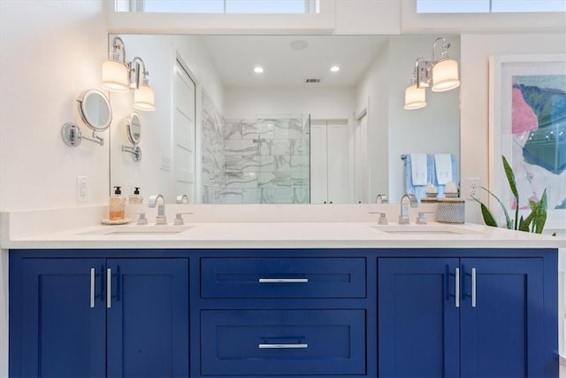 bathroom featuring vanity and walk in shower