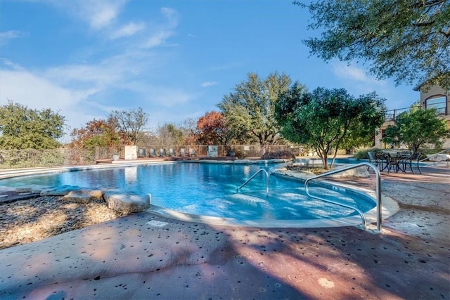 view of pool with a patio area