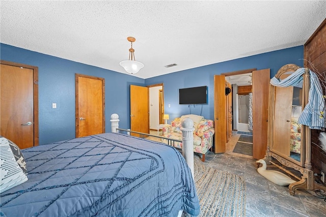 bedroom with a textured ceiling