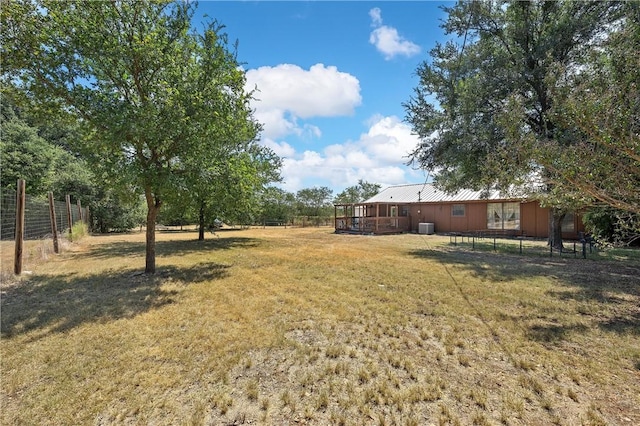 view of yard featuring a wooden deck