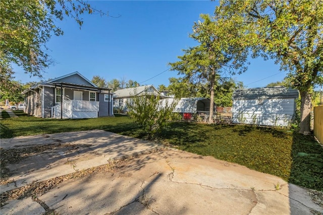 exterior space featuring a porch and a carport