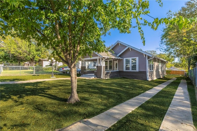 view of front of home with a front yard