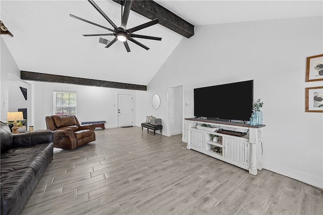 living room with beamed ceiling, ceiling fan, light wood-type flooring, and high vaulted ceiling