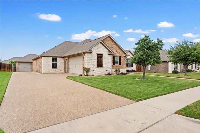 craftsman-style home featuring a front yard and a garage