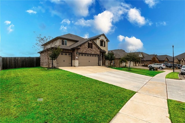 view of front facade featuring concrete driveway, a front yard, and fence