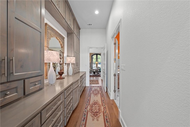 hallway featuring light hardwood / wood-style flooring