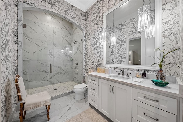 bathroom with ornamental molding, vanity, toilet, and a shower with shower door