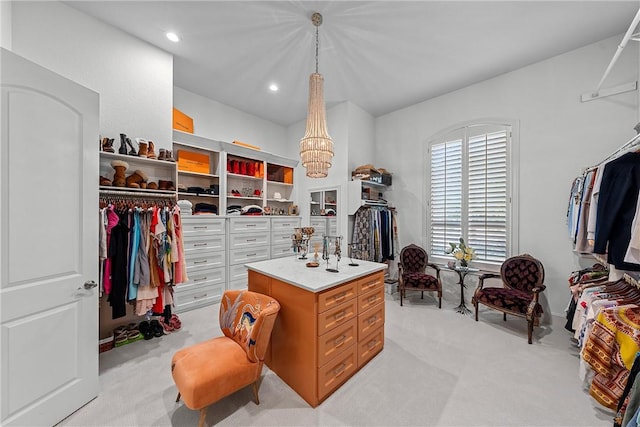 spacious closet with light carpet