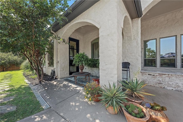 doorway to property featuring a patio